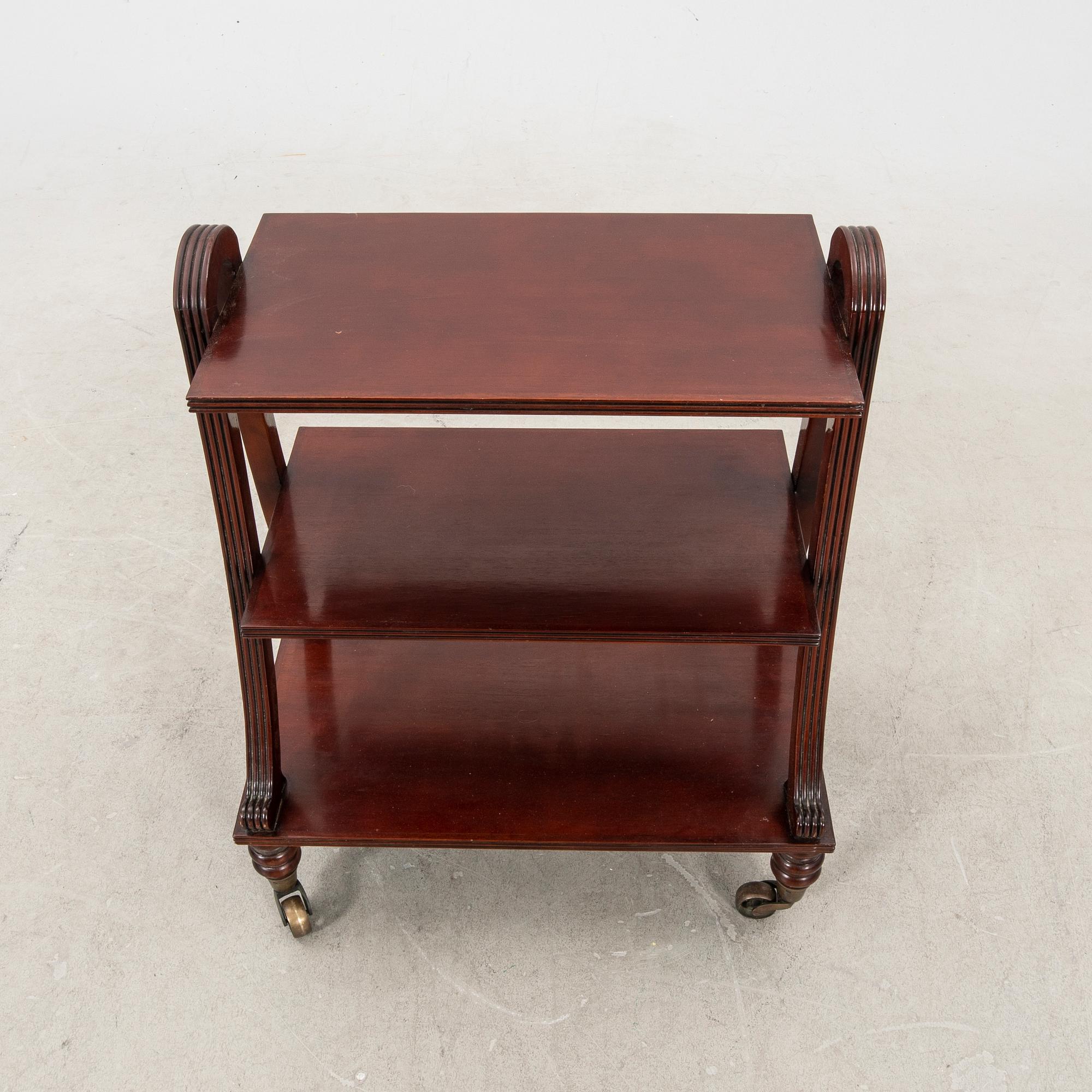 A veneered sideboard/trolley from the first half of the 20th century.