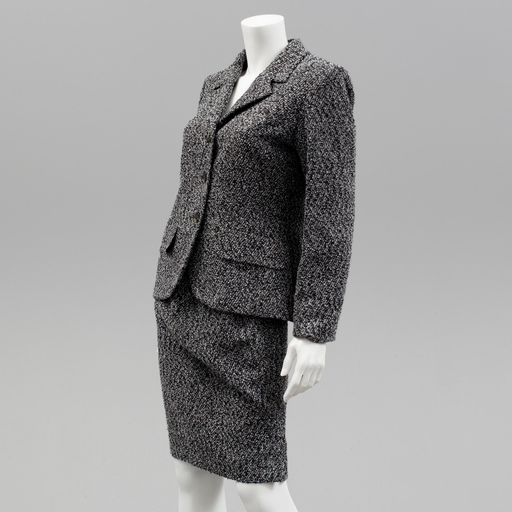 A womens two piece suit by Yves Saint Laurent.