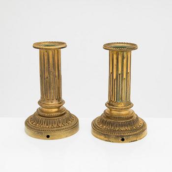 A pair of Louis XVI candelholders, first half of the 19th century.