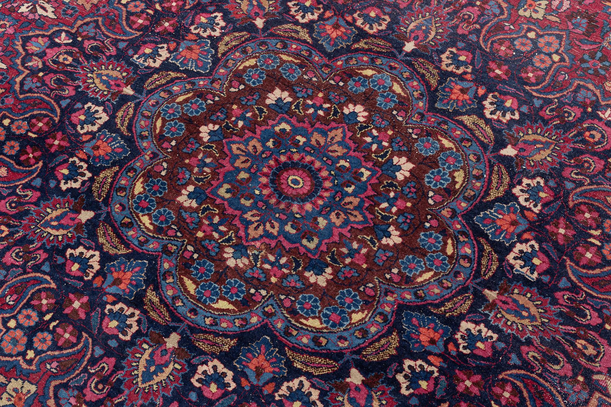 A Meshed carpet, c. 405 x 320 cm.
