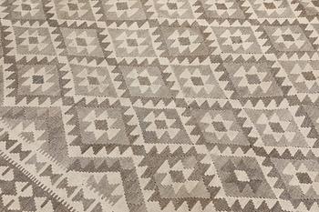 A Kilim rug, approx. 294 x 250 cm.