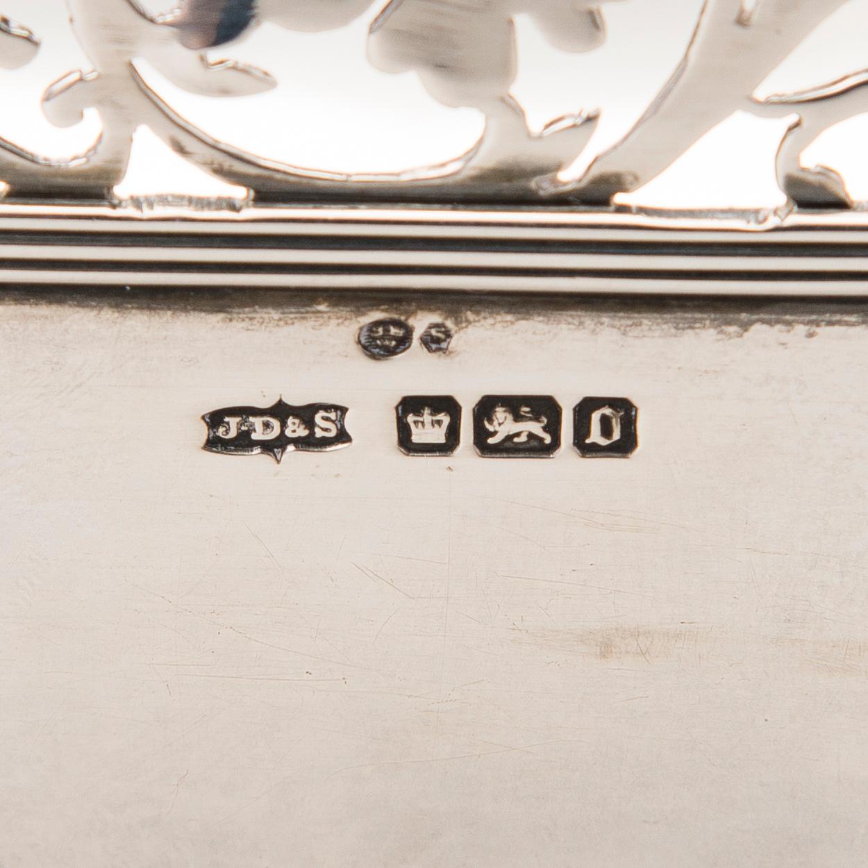 A footed bowl with pierced rim, mark of James Dixon & Sons, Sheffield 1906.