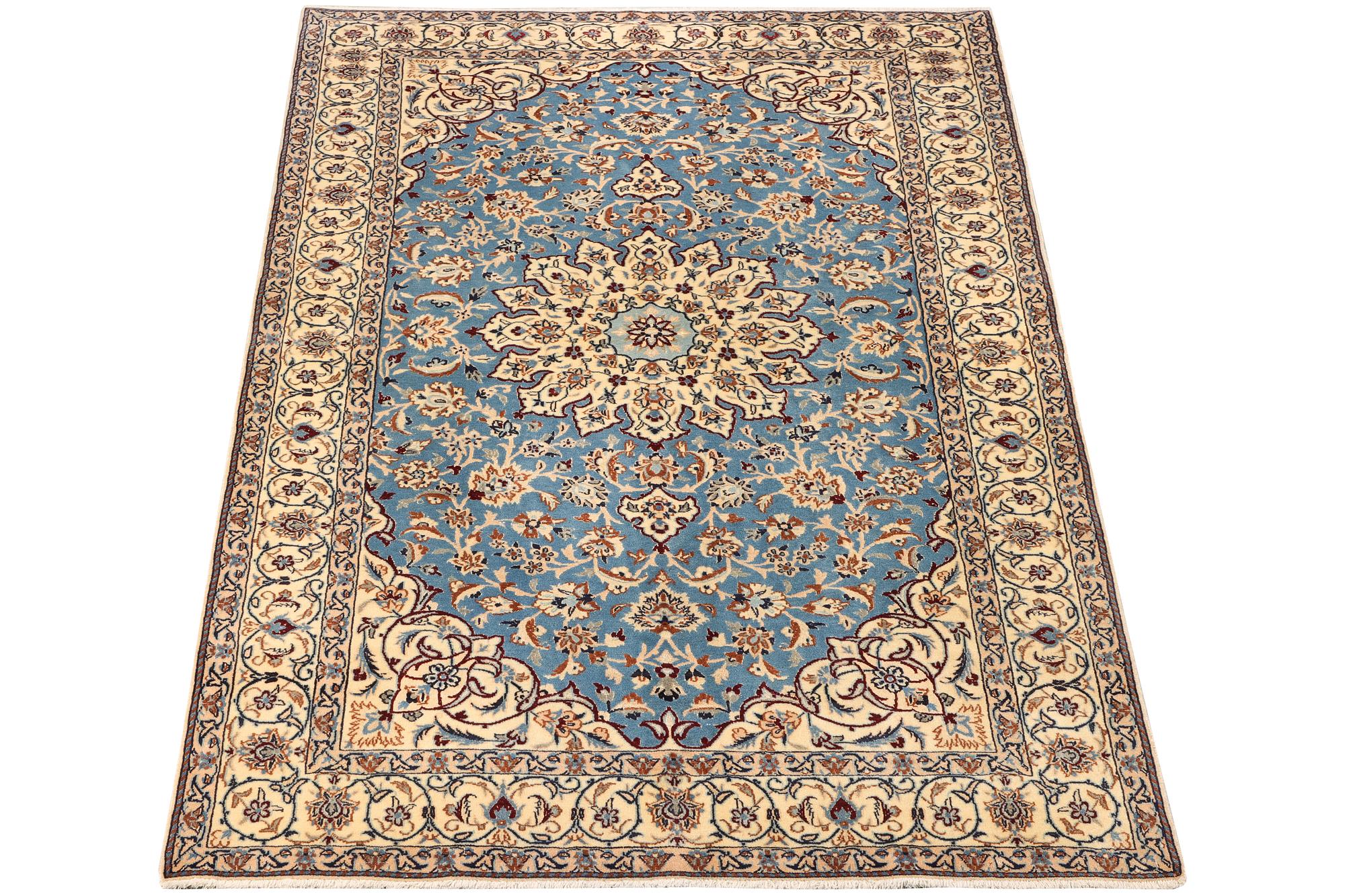 A Nain, part silk carpet, c. 196 x 120 cm.