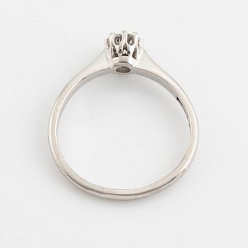 Brilliant cut diamond ring.