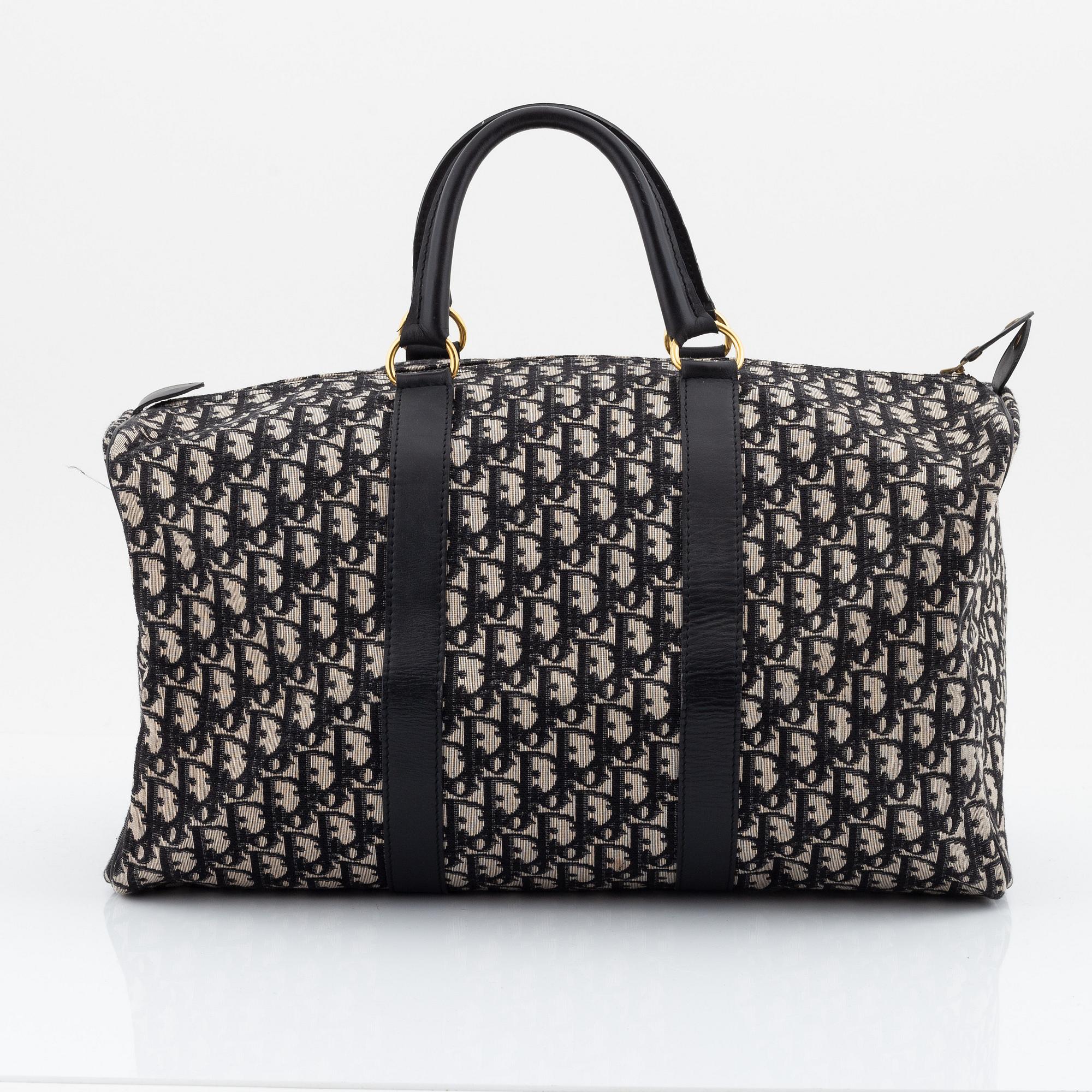 Christian Dior, weekendväska med paraply.