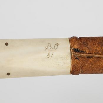 A Sami reindeer horn knife, unidentified signature B.O, dated 81.