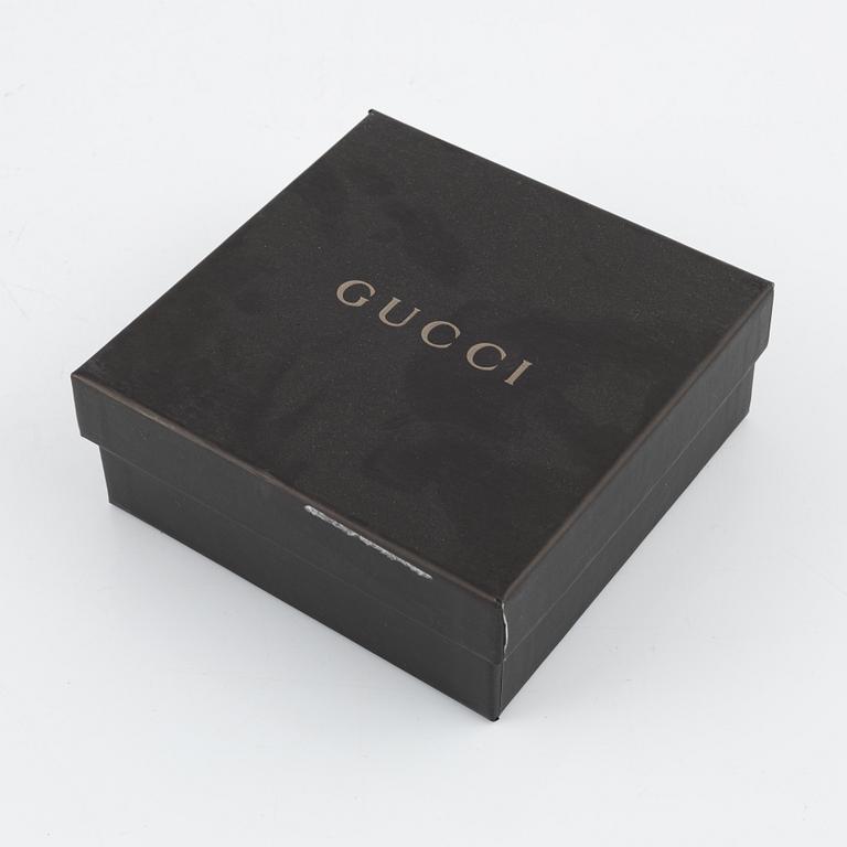 Gucci, an ostrich wallet, 2005.