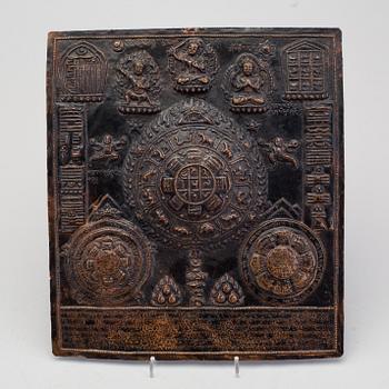 A Nepalese/Tibetan copper alloy relief panel, 19th century.