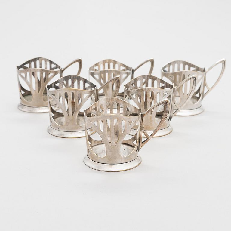 A set of six, early 20th-century WMF silver plated toddy glass holders, model 143, Germany ca. 1903-10.