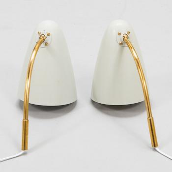 Lisa Johansson-Pape, A pair of 1950s '3054' wall lights for Stockmann Orno.