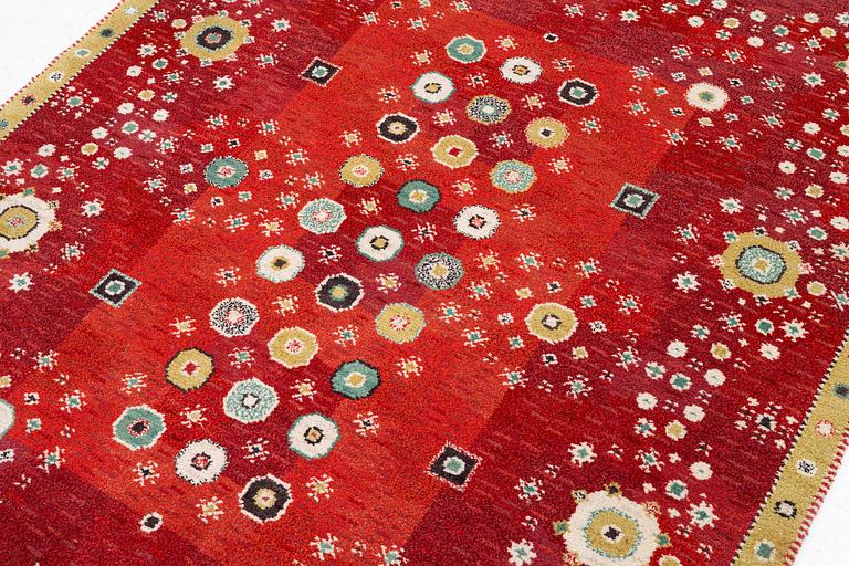 Barbro Nilsson, a 'Rabatten röd' carpet, knotted pile, 266 x 195 cm, signed AB MMF BN.