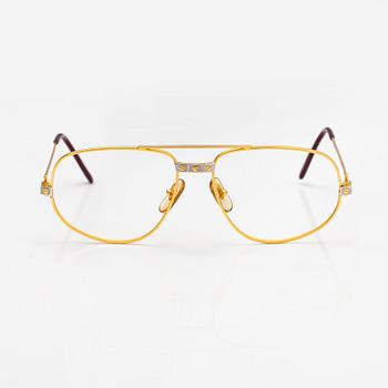 must de Cartier, Santos, a pair of eyeglass frames. Marked Cartier, Paris, Made in France 135, 56, 16.