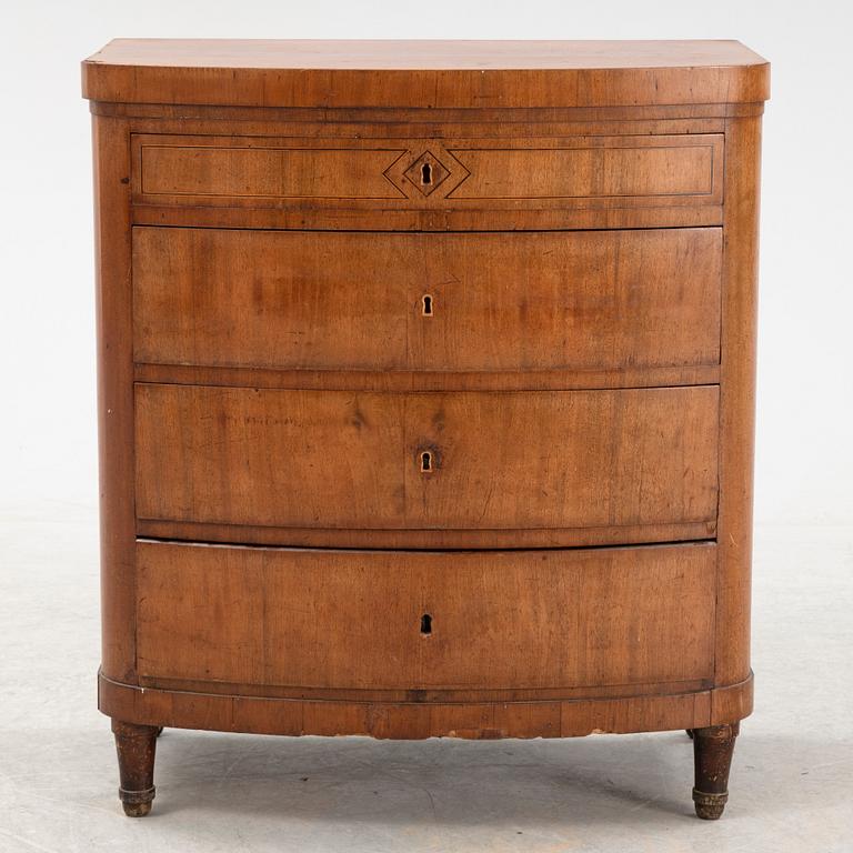 An empire style chest of drawers, 19th Century.