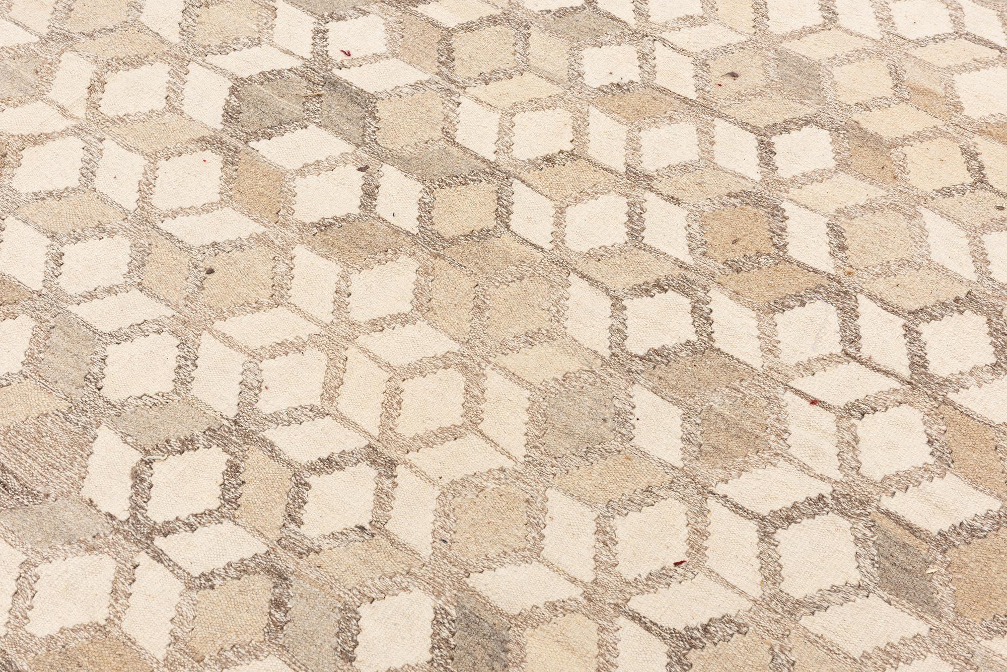A Kelim carpet, c. 224 x 216 cm.