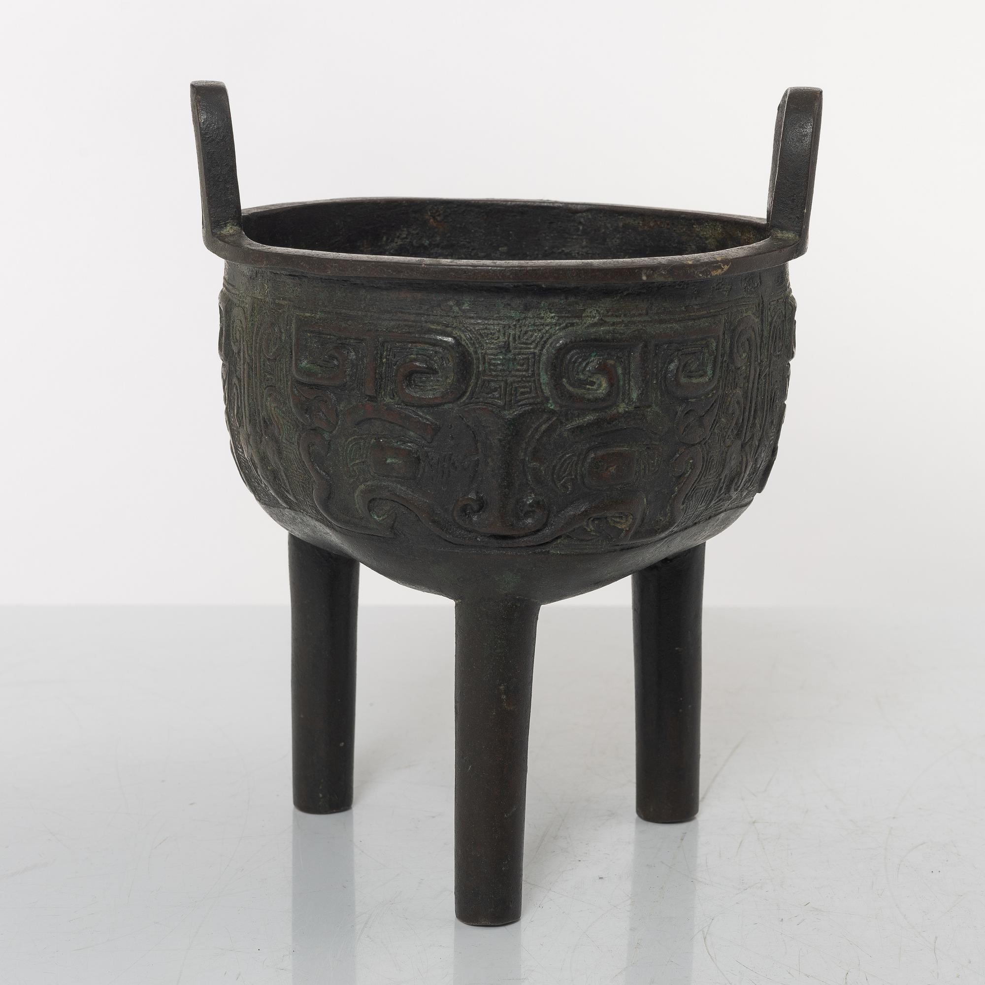 A Chinese tripod bronze censer, Ming style, Qing dynasty (1644-1912).
