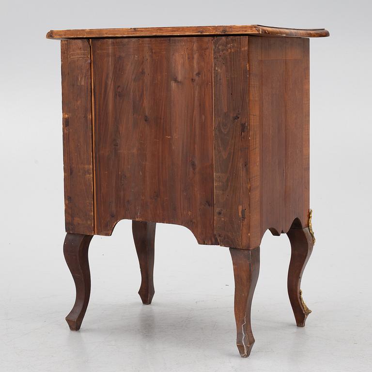 A Rococo-style chest of drawers, 19th century.