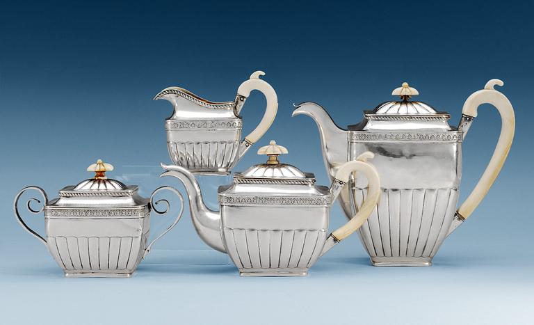 A RUSSIAN PARCEL-GILT FOUR PIECE COFFEE- AND TEA-SET, makers mark of Sasikov, Moscow 1834.