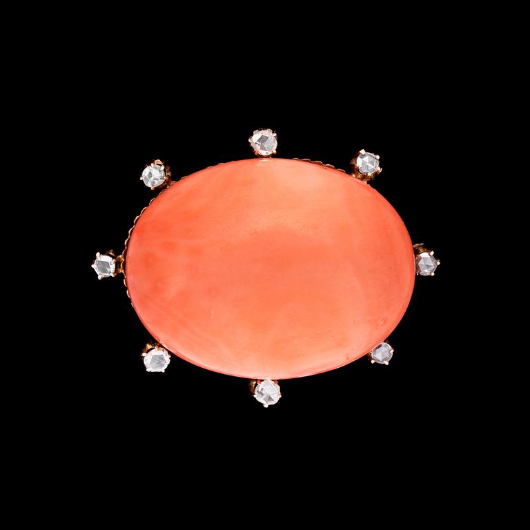 A large cabochon cut coral and rose cut diamond brooch, c. 1900.