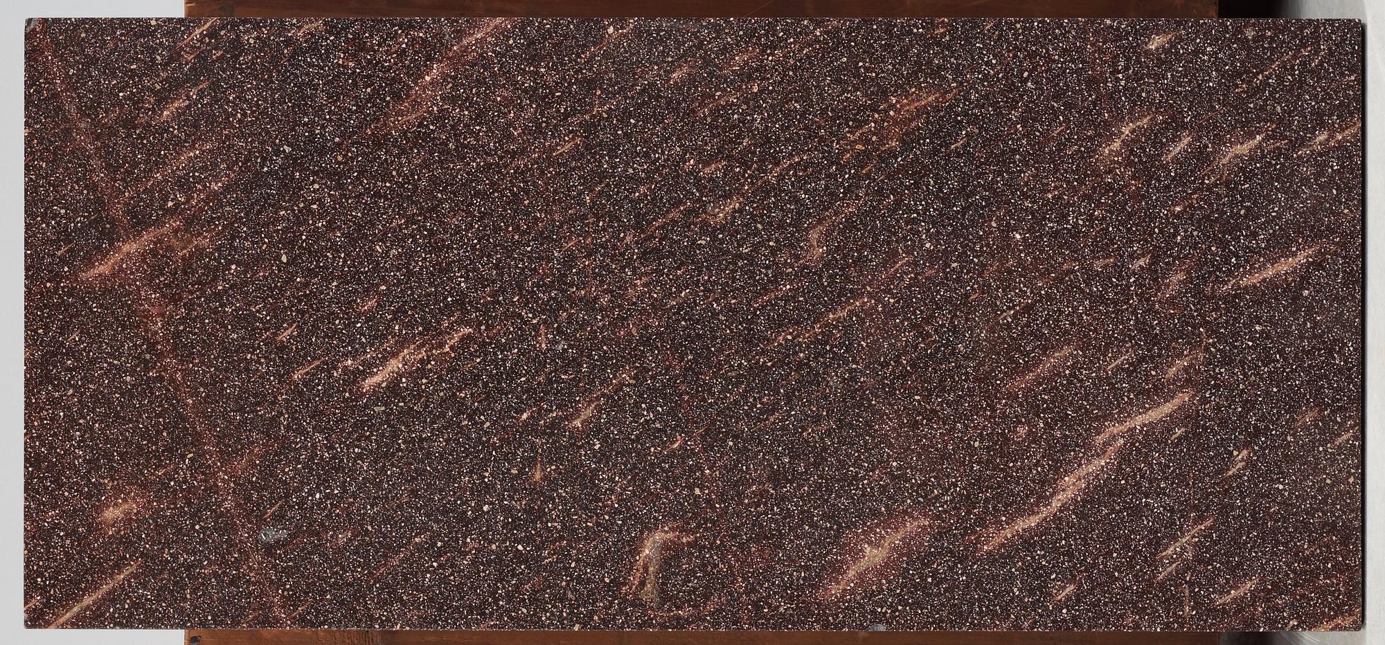 A Swedish Empire 19th century writing commode with porphyry top.