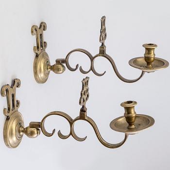 A PAIR OF BRONZE WALL LIGHTS, 17th/18th century.