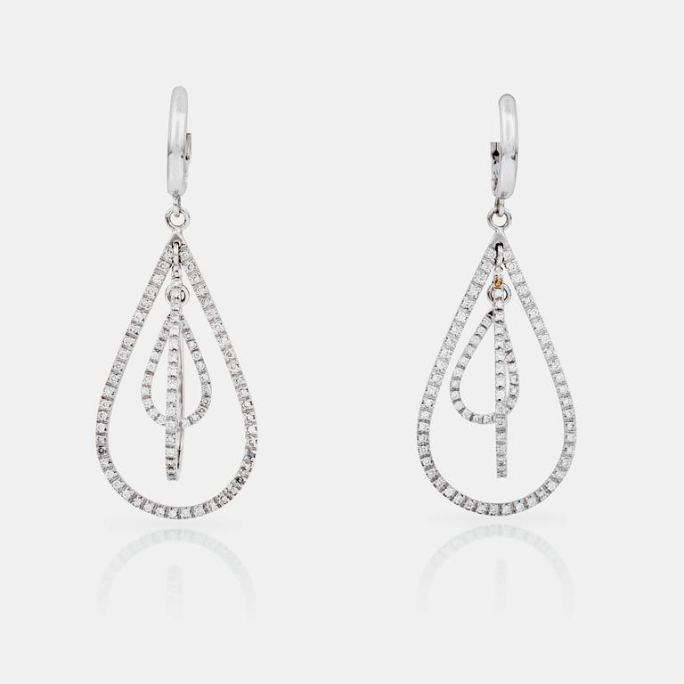 A pair of brilliant-cut diamond earrings. Total carat weight circa 1.50 cts. Quality circa F-G/VS-SI.