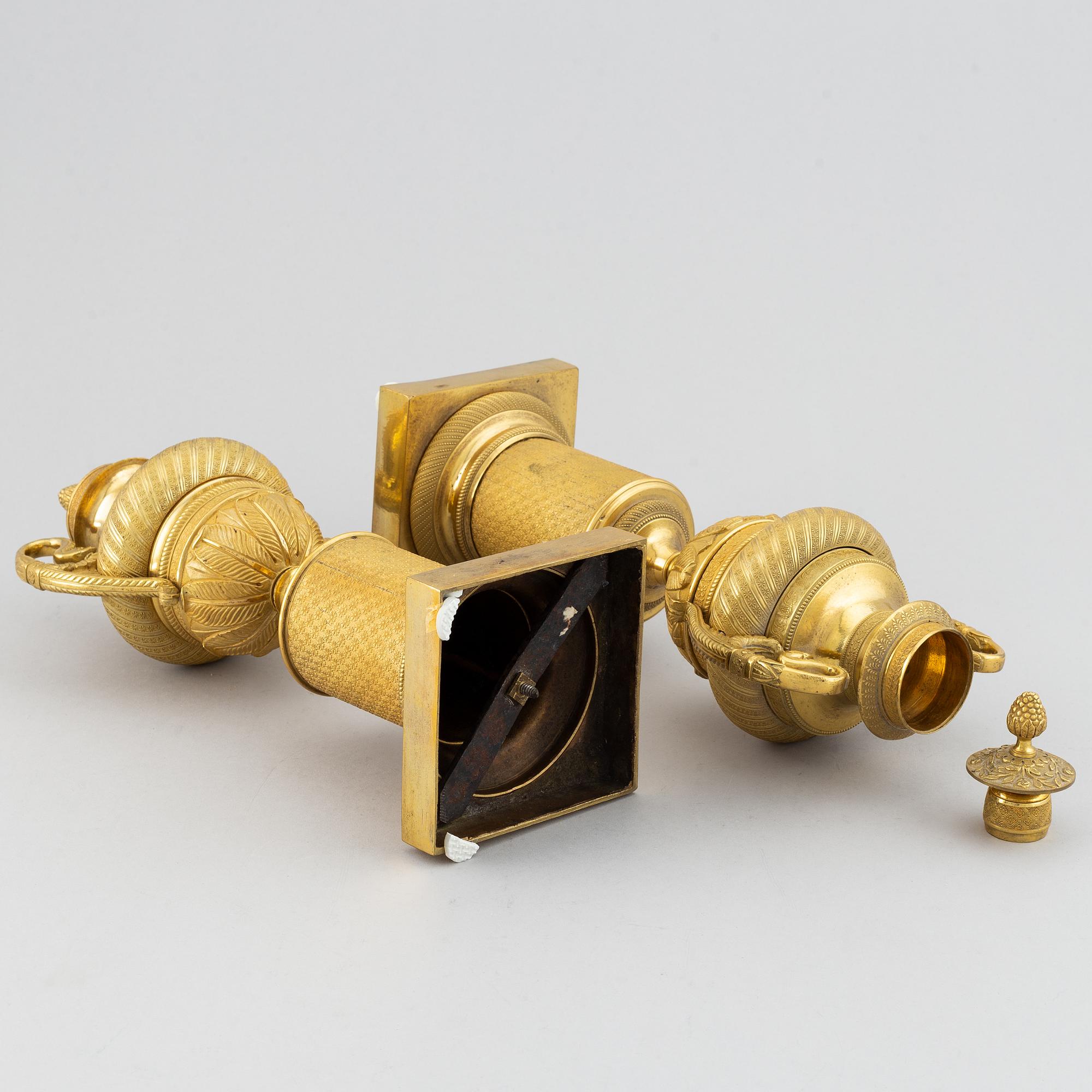 A pair of French Empire candlesticks, early 19th century.