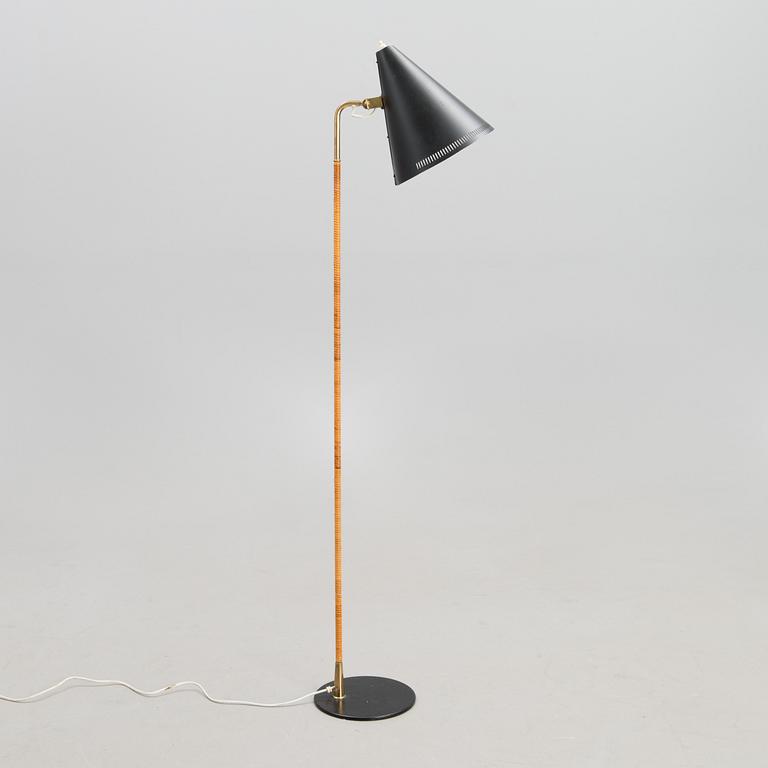 A mid-20th century standard lamp model K10-10 for Idman.