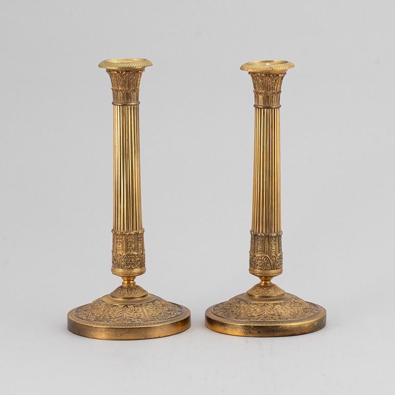 A pair of candlesticks, empire style.