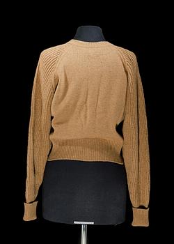 A wool cardigan by Chanel.