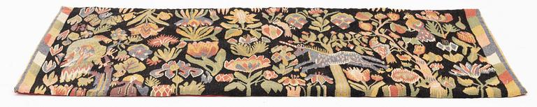 A carrige cushion, "Unicorn and Parrot", tapestry, c 100 x 50 cm, proably from Torna district, circa 1900.