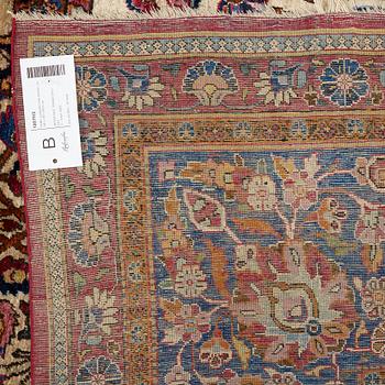 A carpet, a semi-antique silk Kashan, ca 317 x 207-210,5 cm.