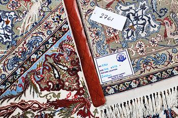 A carpet, Old Esfahan, part silk, ca 308 x 202 cm.
