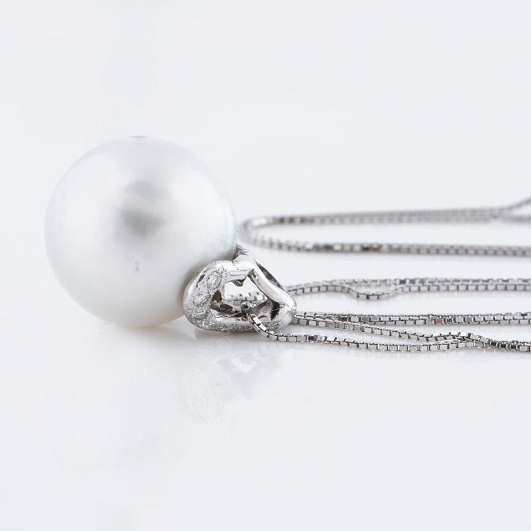 A cultured pearl and ca 0.15 cts brilliant cut diamond pendant.