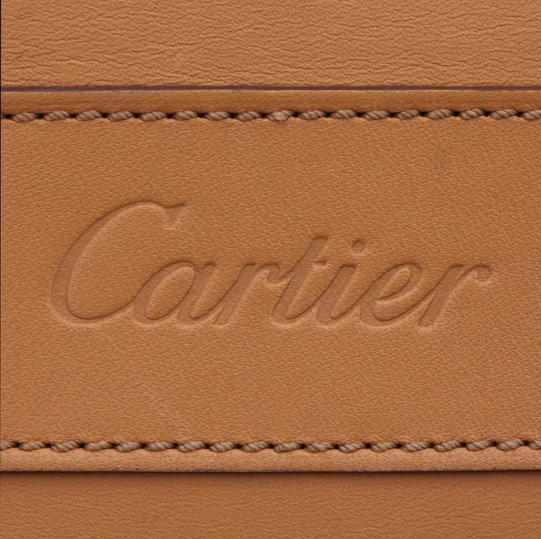 CARTIER, a beige leather briefcase.