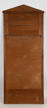 An Empire mirror, first half of the 19th Century.