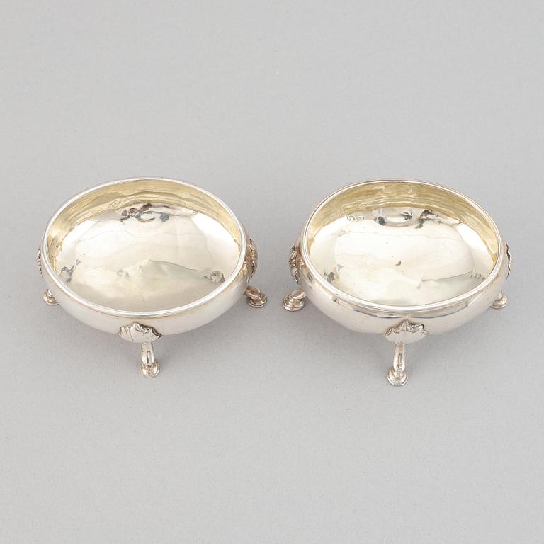 A pair of silver saltcellars, London, England.