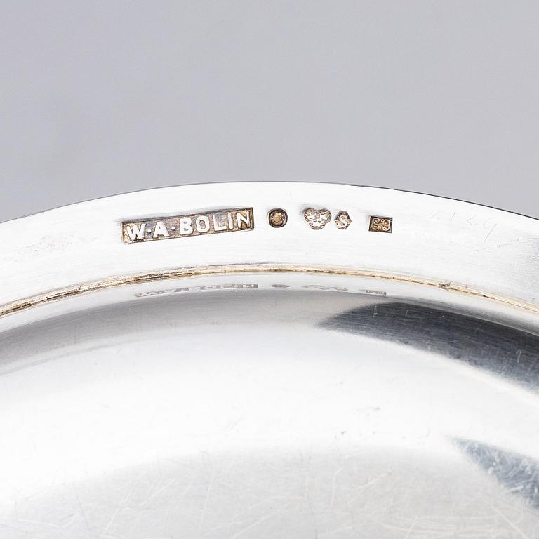 A Swedish silver dish and two silver coasters, marks of W.A. Bolin, Stockholm 1957.
