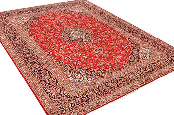 A Kashan carpet, c. 388 x 295 cm.