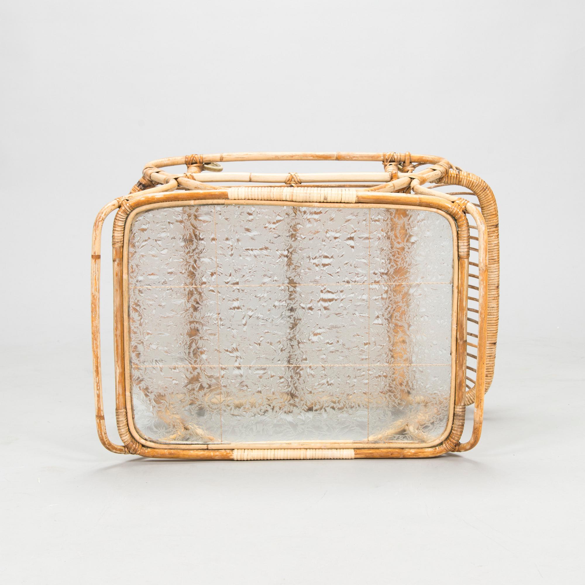 A mid 1900s bamboo and rattan serving trolley.