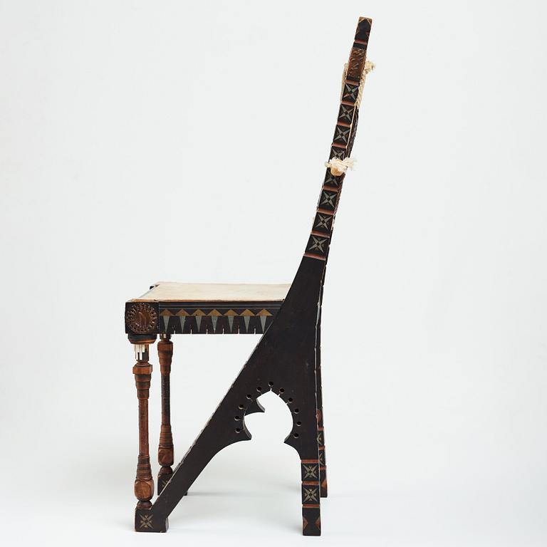 Carlo Bugatti, CARLO BUGATTI, an ebonized wood and walnut chair, Turin, Italy ca 1900.