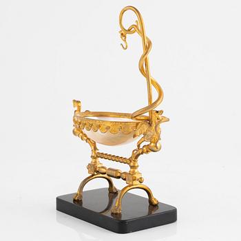 A gilt-brass, mother of pearl and diabase pocket-watch stand, late 19th century.