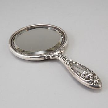 A sterling silver mirror from around year 1900.