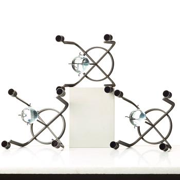 Gunnar Ander, a set of three iron and glass candlesticks for Ystad Metall, Sweden, mid 20th century.