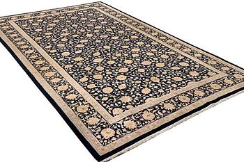 A Meshed carpet, c. 538 x 298 cm.