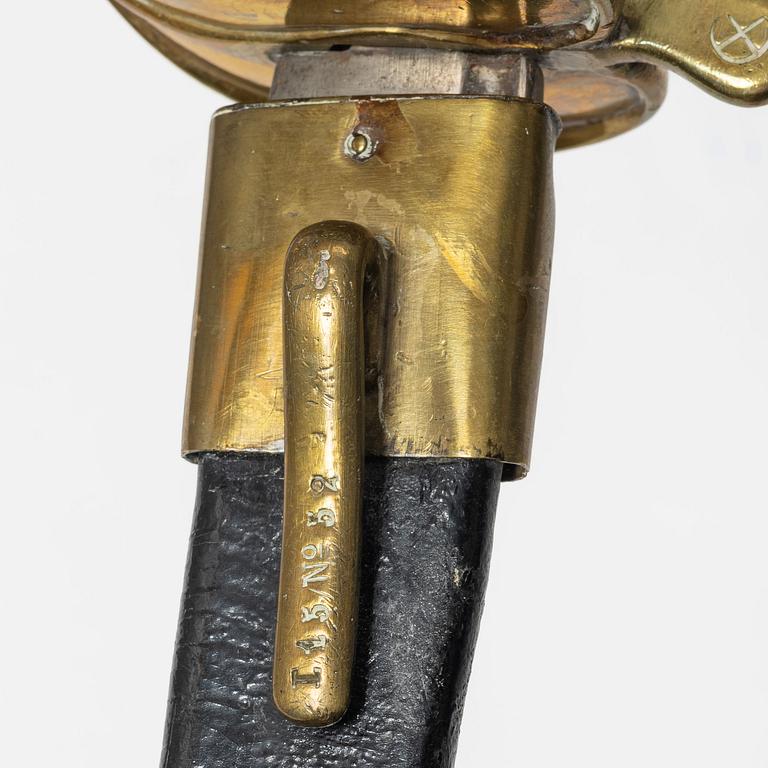 A Swedish police sabre and cutlass, with scabbards.