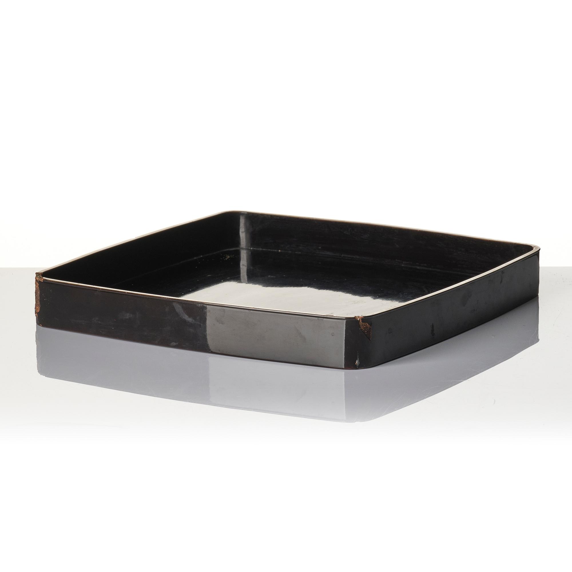 A Japanese lacquer tray and three Japanse wooden boxes.