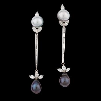 1144. A pair of diamond, tot. 4 cts and cultuled South sea and Tahtiti pearl earrings.