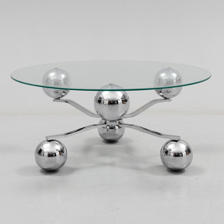 A 1960s / 70s coffee table with glass top.