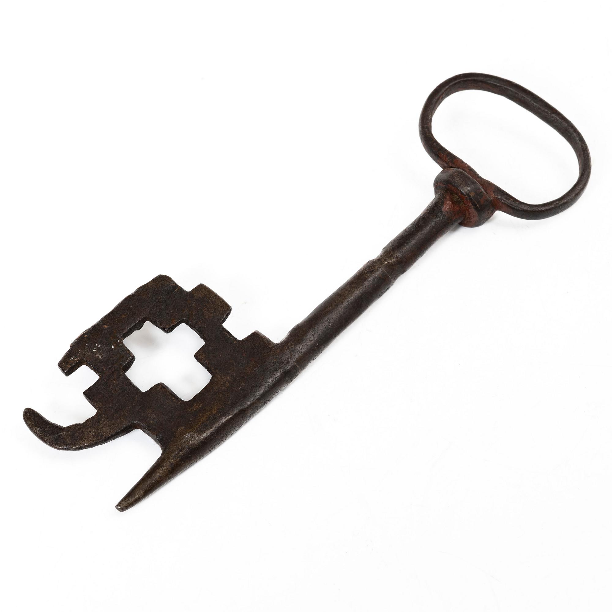 A set of a wrought iron key and wick snuffer, 17th - 18th century.