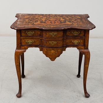 A Dutch 18th century Rococo chest of drawers.